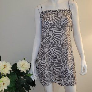 Dippin' Daisys Love Letters Sun Dress. White and grey animal print. Size XL. NWT